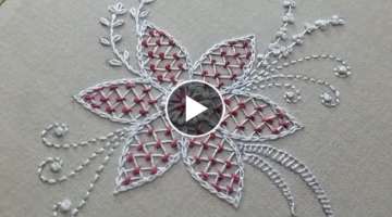 Hand embroidery of a flower pattern with net stitch